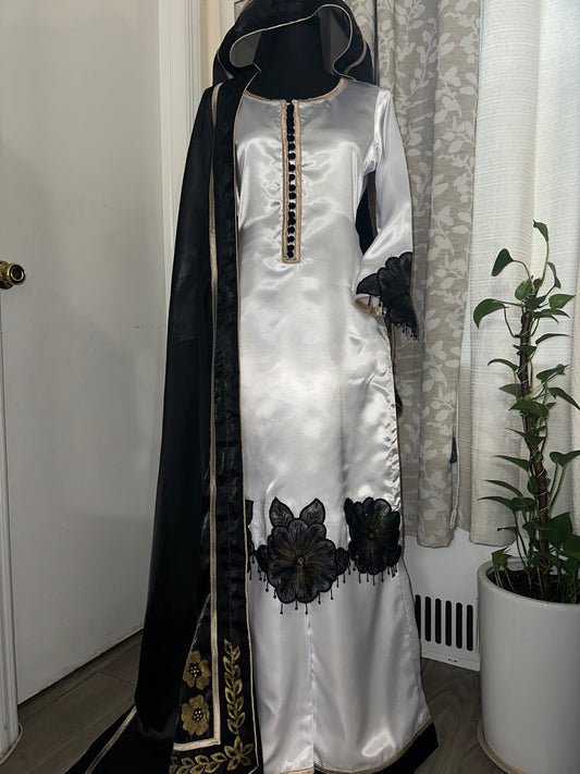 Black and white contrast suit.