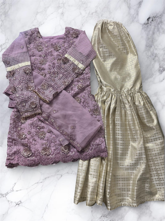 Purple and gold sharara suit.
