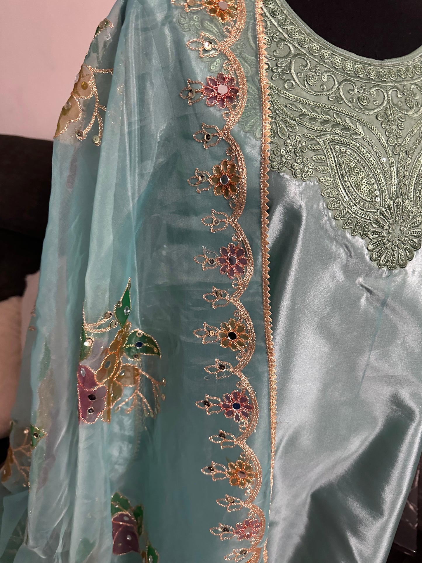 See green Farshi shalwar set.